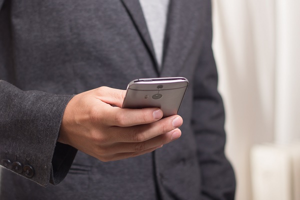 A man using a mobile phone